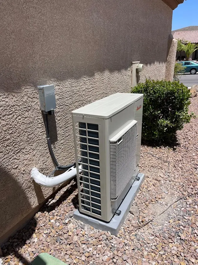 Residential air conditioning condenser unit in Redmond